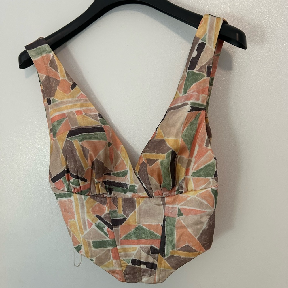 Multicolored Geometric Top